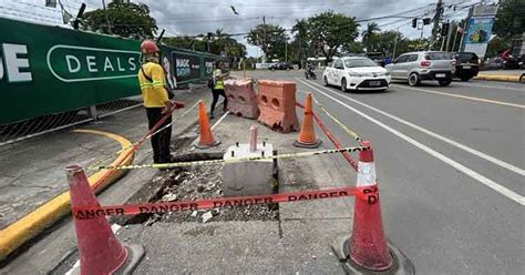 Only metal posts removed, concrete bases remain .